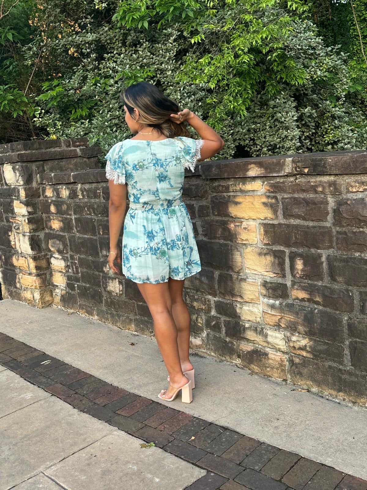 Emily - Short sleeve V-neck lace detailed floral romper